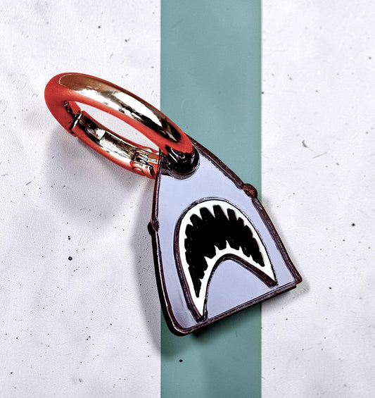 Morti's Fun Club Bite Me shark mouth collar charm in silver mirror acrylic with black and white inlay.