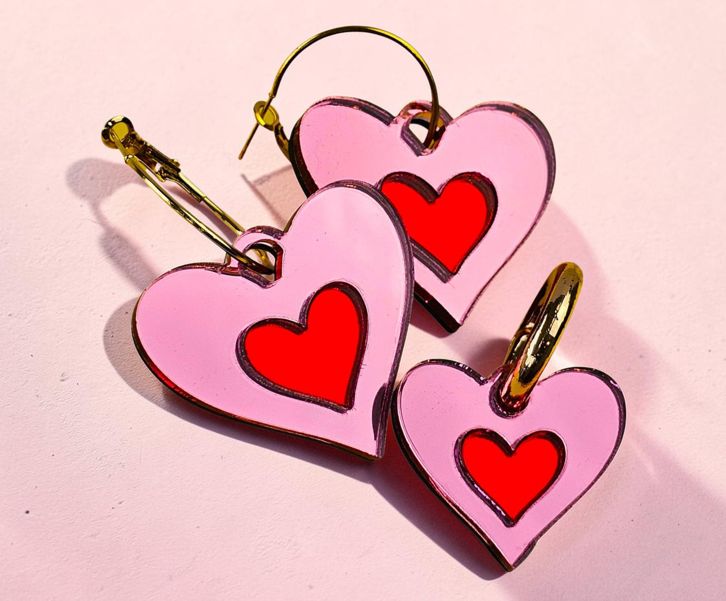 Morti's Fun Club Cherry Blossom heart earrings and matching collar charm in pink and red acrylic with silver hoops.