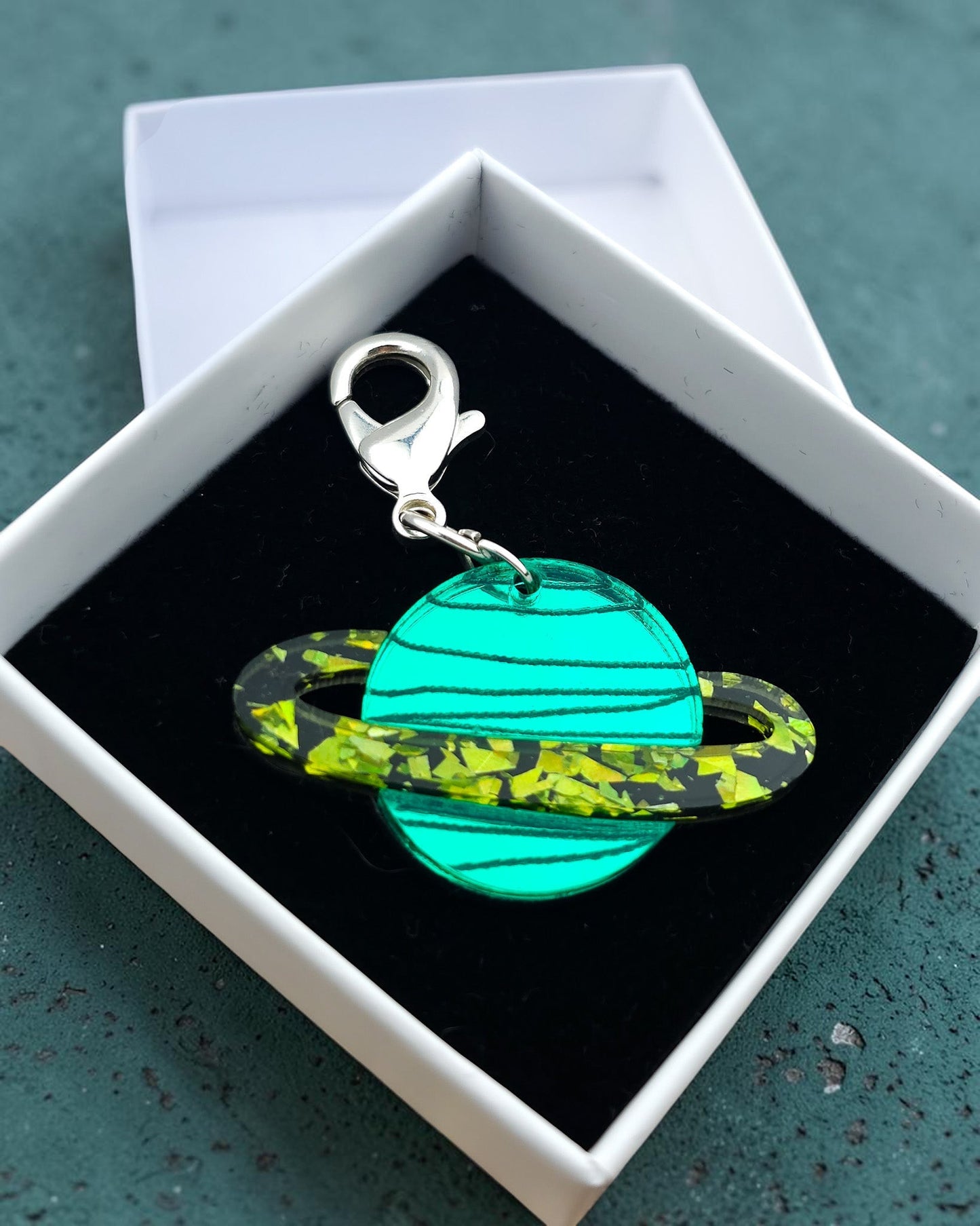 Morti's Fun Club green mirrored acrylic Saturn dog collar charm with lime green glitter ring in a gift box