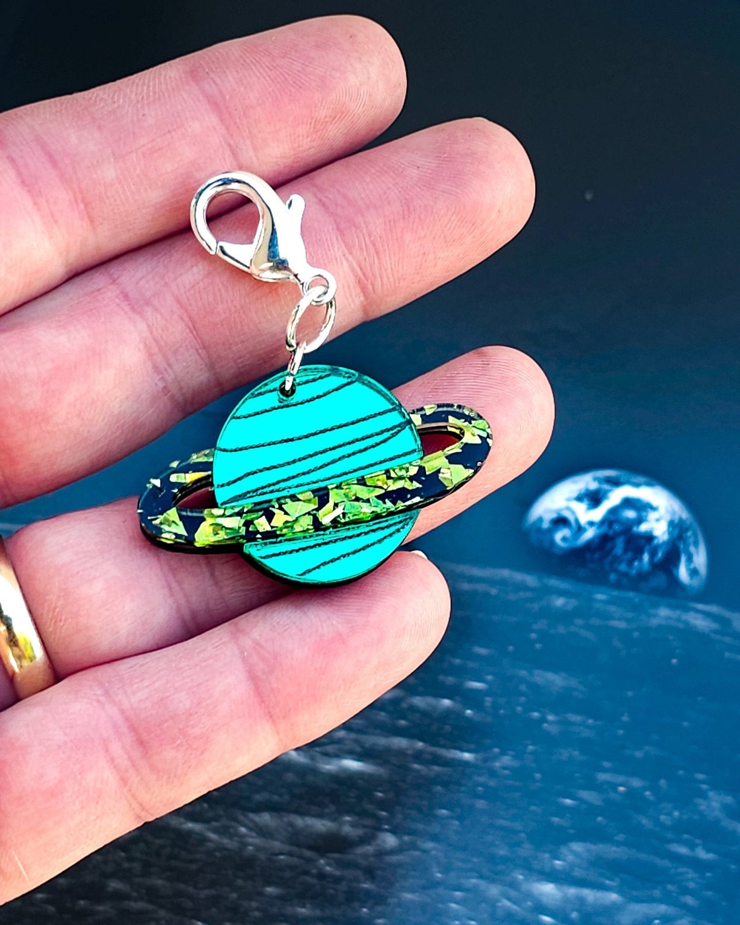 Morti's Fun Club green mirrored acrylic Saturn dog collar charm with lime green glitter ring and silver clasp