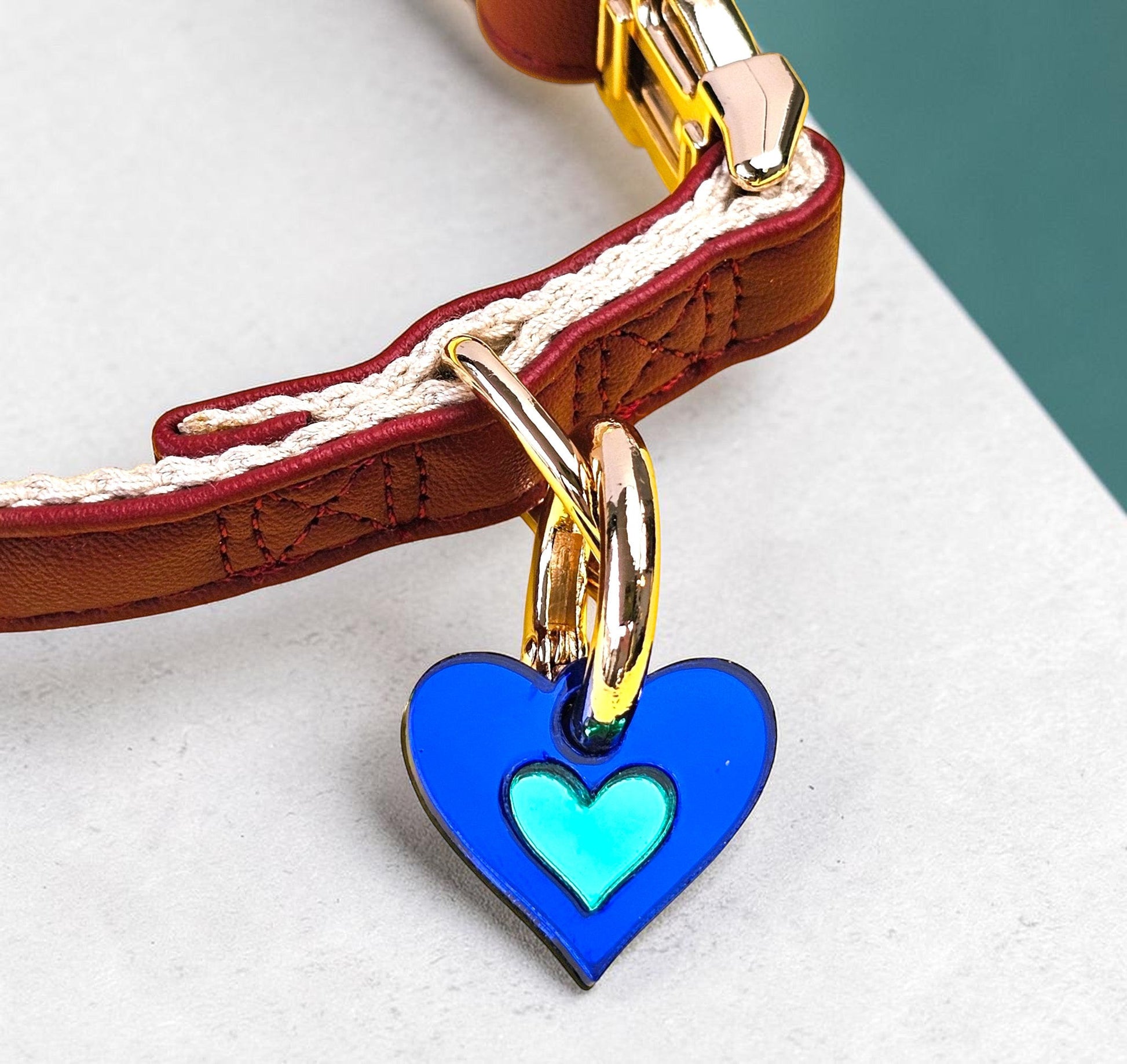 Morti's Fun Club Sea Creature heart collar charm in royal blue and green acrylic hanging from a silver-plated clip