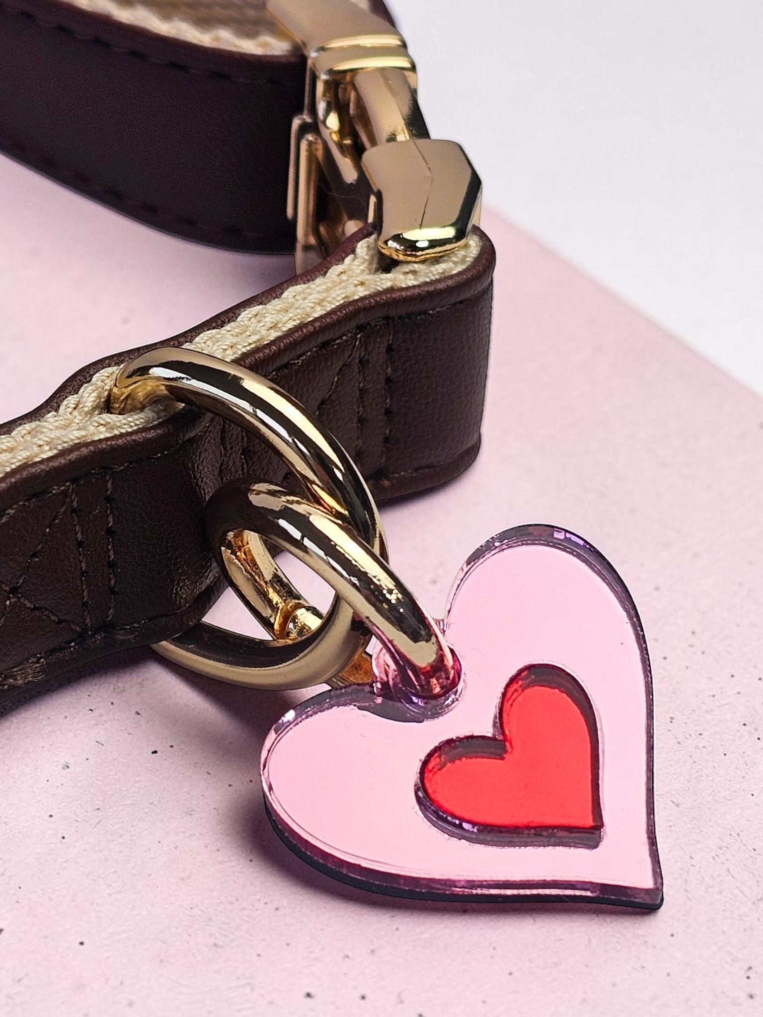 Morti's Fun Club Cherry Blossom heart collar charm in pink and red acrylic attached to a brown leather dog collar