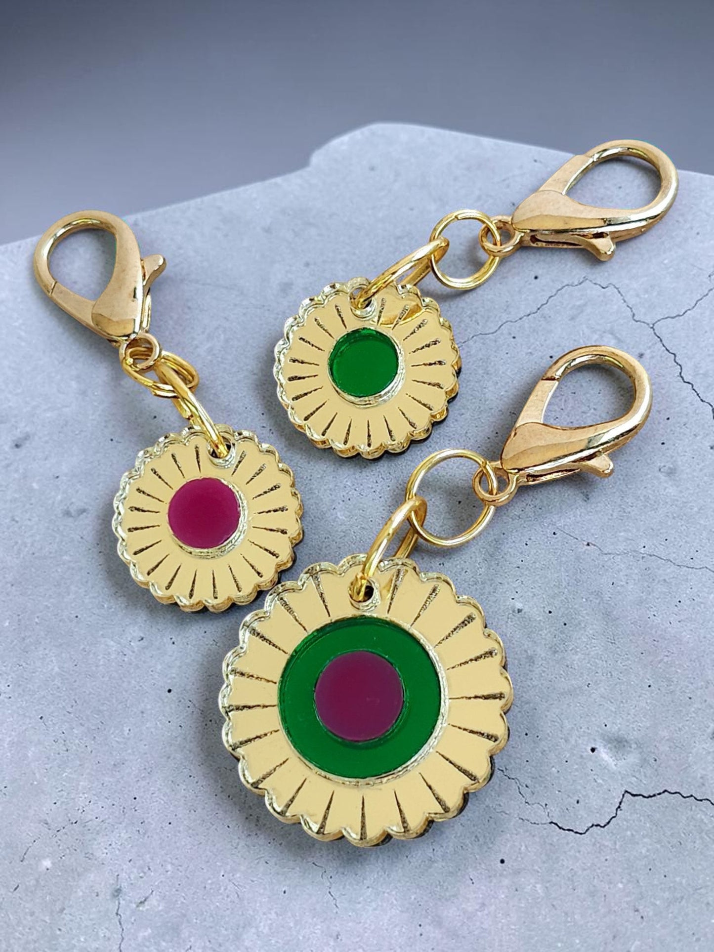Morti's Fun Club Jurassic Bloom mirror acrylic flower charm with gold lobster clasp and green or purple centres.