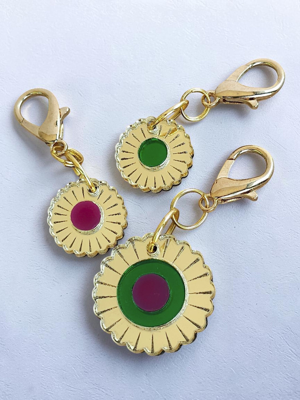 Morti's Fun Club Jurassic Bloom mirror acrylic flower charm with gold lobster clasp and green or purple centres.