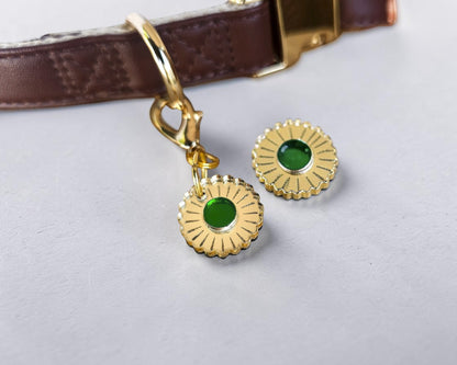 Morti's Fun Club Jurassic Bloom collar charm featuring a gold mirror acrylic flower design with a vibrant green center.
