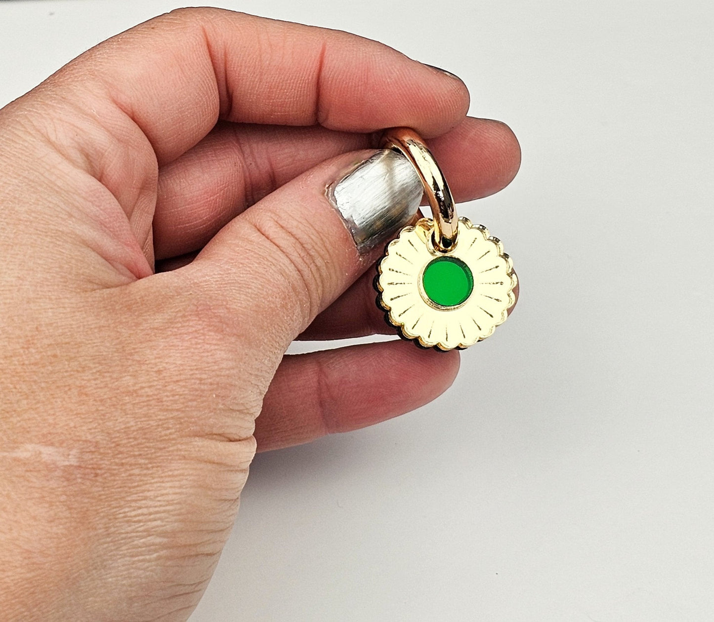 Morti's Fun Club Jurrasic Bloom small collar charm in mirrored gold acrylic with a vivid green center on a gold clip