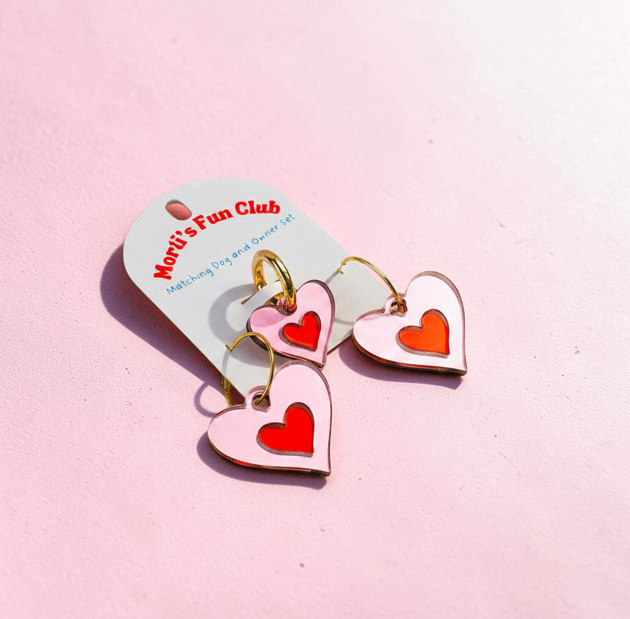 Morti's Fun Club matching heart jewelry set for pets and owners featuring pink acrylic hearts with red centers.