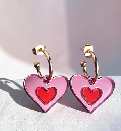 Morti's Fun Club Cherry Blossom heart earrings in pink and red mirrored acrylic with gold-plated hoops.
