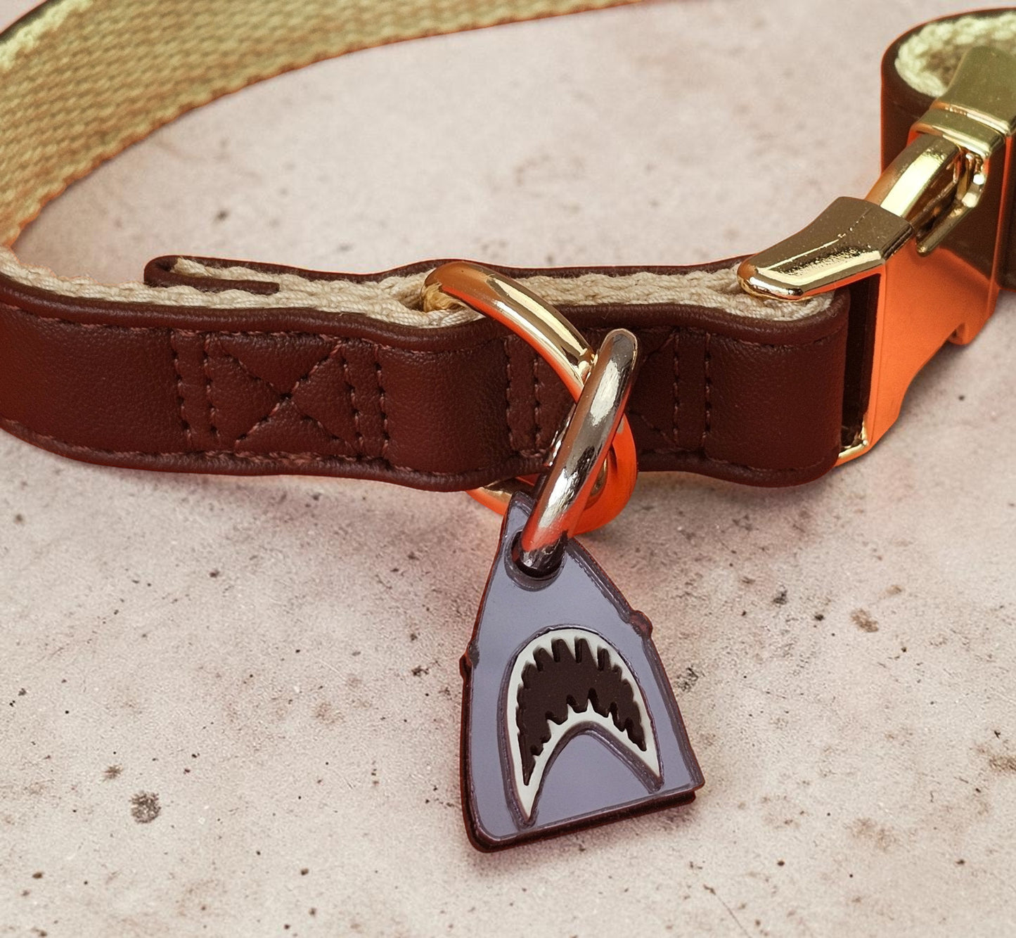 Morti's Fun Club shark dog collar charm in mirrored silver acrylic with black and white shark teeth detail