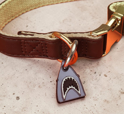 Morti's Fun Club shark dog collar charm in mirrored silver acrylic with black and white shark teeth detail