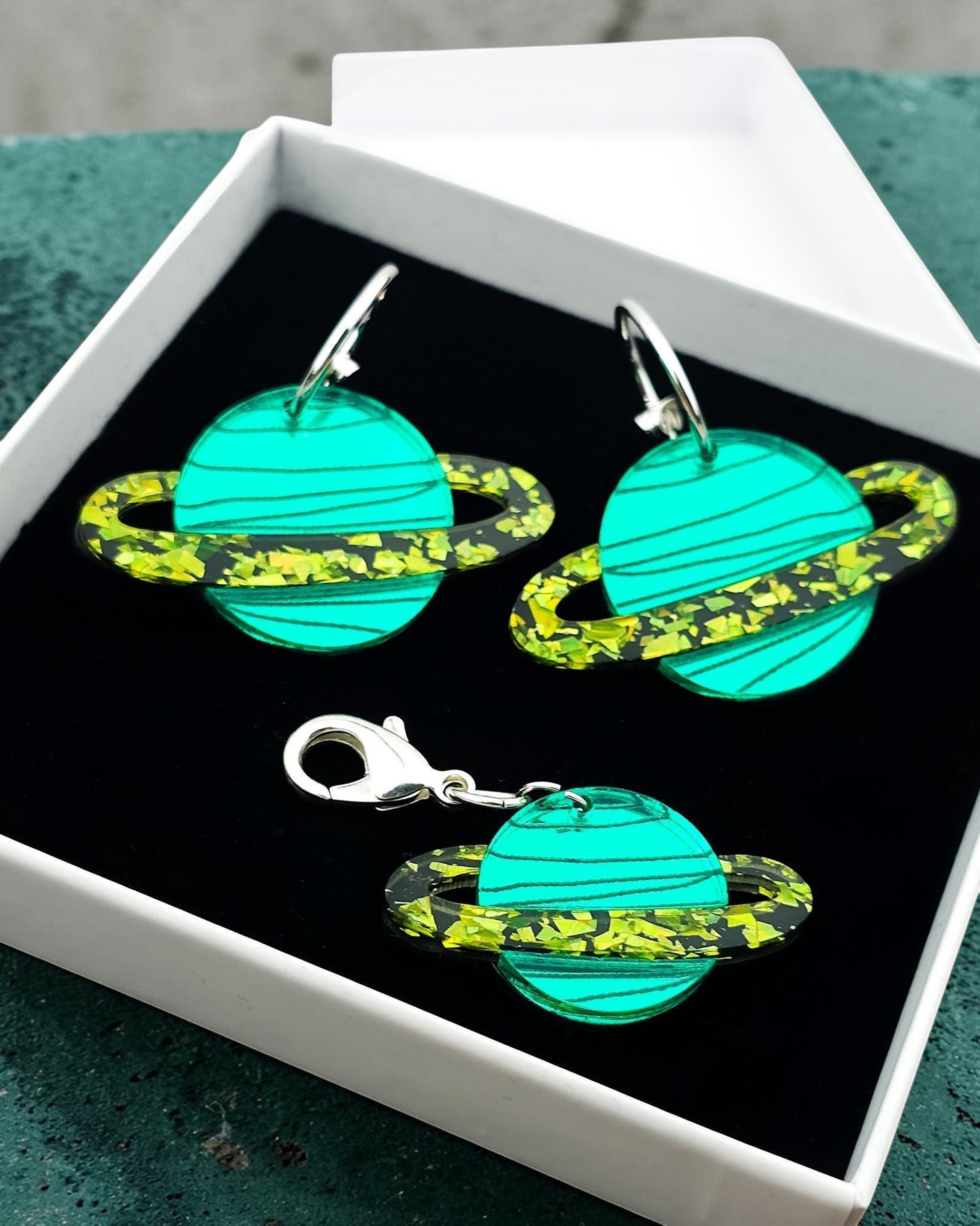 Morti's Fun Club Solar System twinning set with green acrylic planet earrings and matching collar charm in gift box.