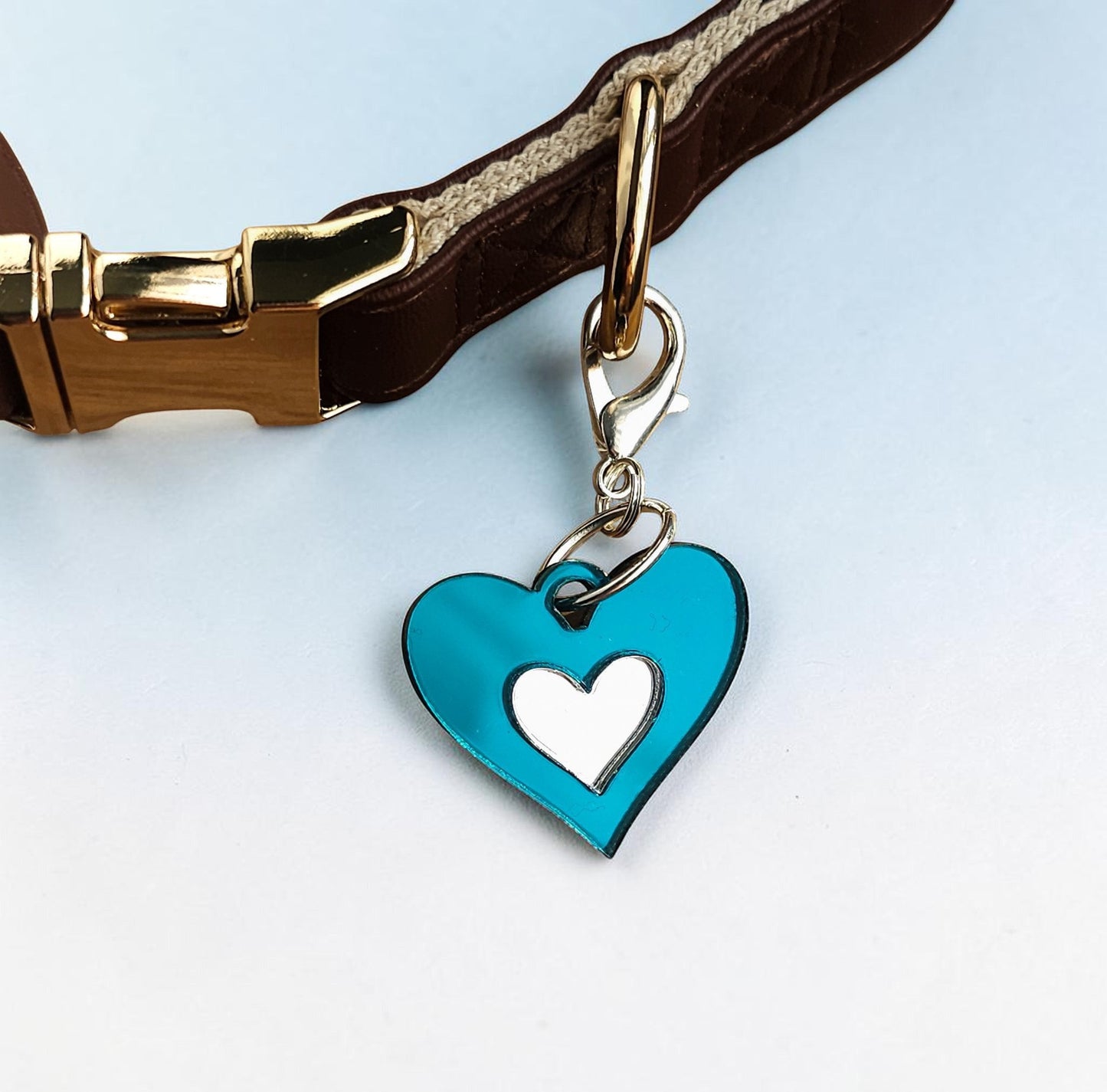 Morti's Fun Club Ice Queen heart collar charm in shimmering teal and silver acrylic with a silver-plated clip.