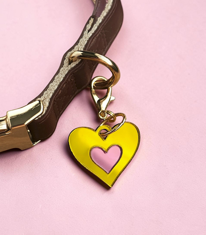 Morti's Fun Club Canary Candy heart collar charm in yellow and pink acrylic with a gold-plated lobster clip